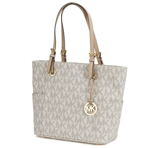 michael kors jet set vanilla handbag|Michael Kors jet set charm.